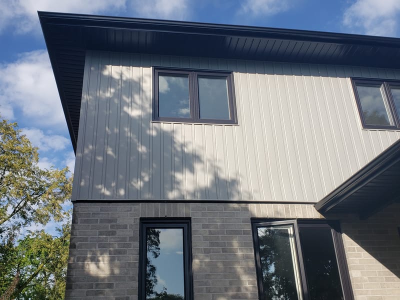 Siding and eavestrough details on a completed exterior renovation