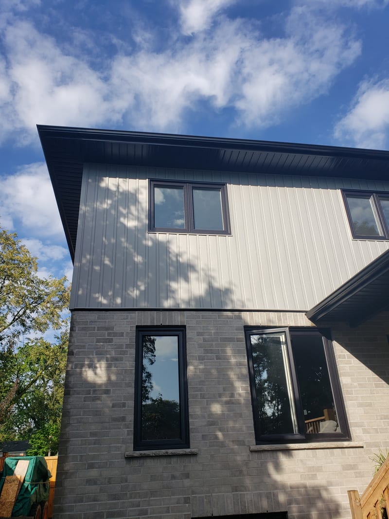 Seamless eavestrough downspout installation GTA exterior renovation project